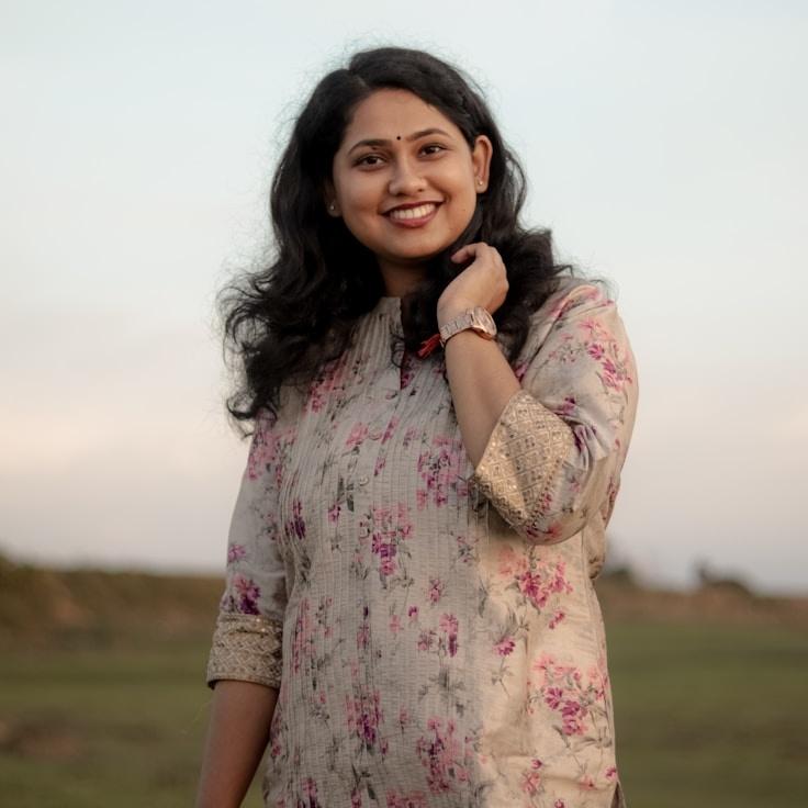 Nova Kapoor, Client Relations Director, discussing corporate gifting strategy with business clients